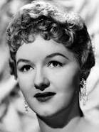How tall is Joan Sims?
